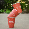Red and white biodegradable single wall paper cups with 'Jobindex' logo